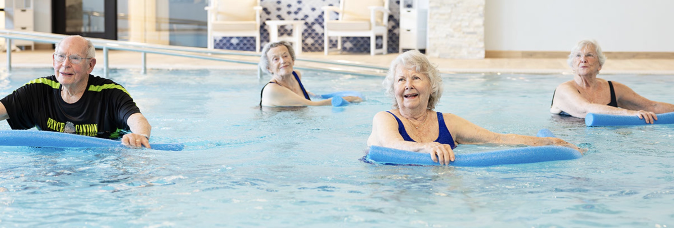 Blakeford residents attending a class in a pool.